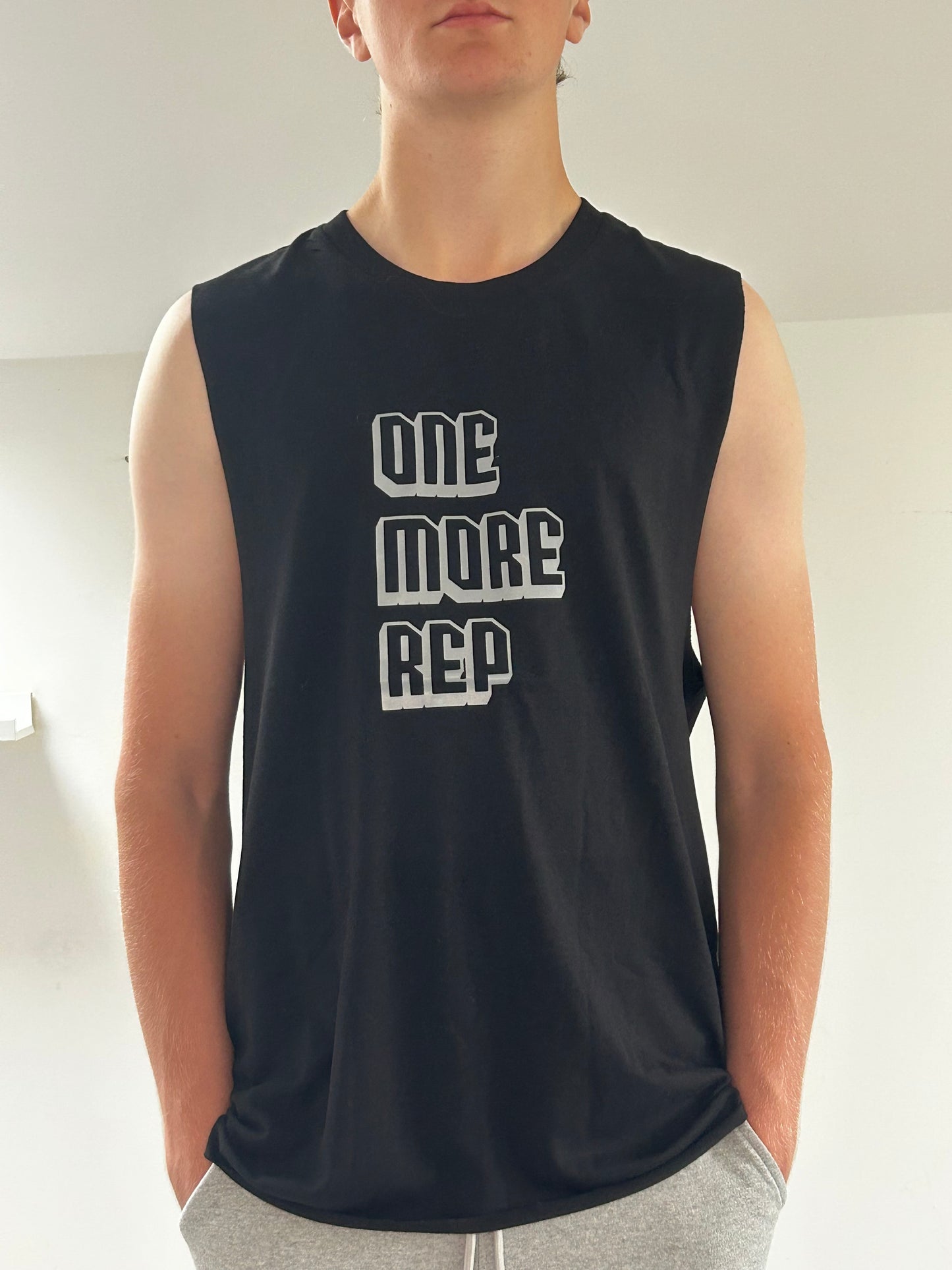 'One More Rep' men's sleeveless T-shirt